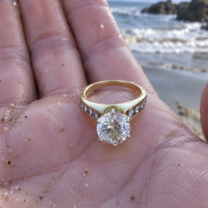 Woman Finds Diamond Ring On Beach